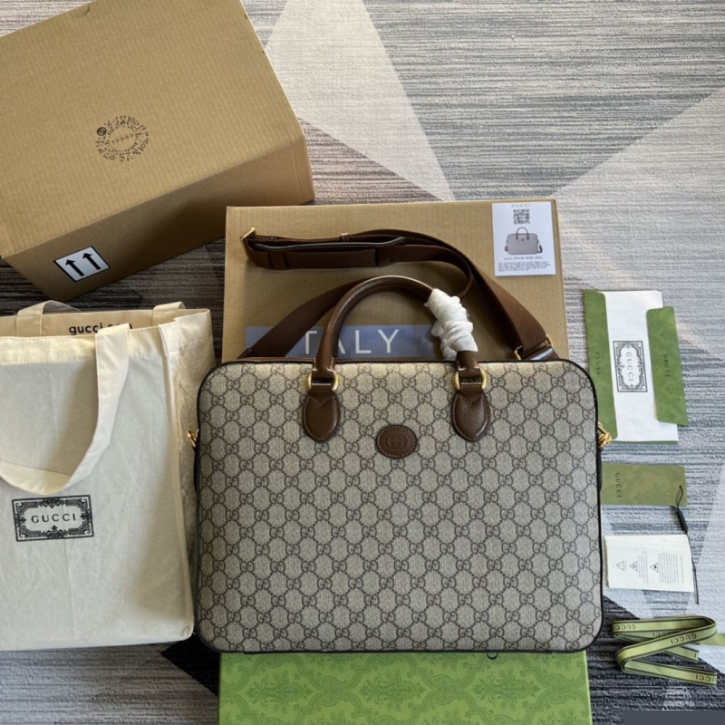 G*u*i shopping bags